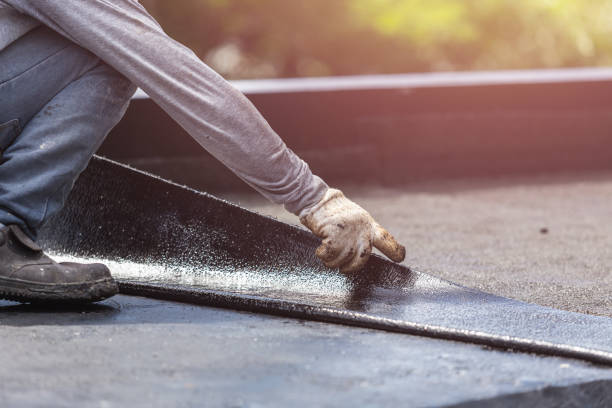 Professional Waterproofing technician working in Fowlerville, MI
